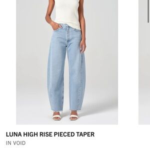 Agolde High Rise Tapered Jeans in Light Blue